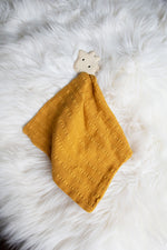 Giraffe Rubber Teether with a Mustard Muslin Comforter